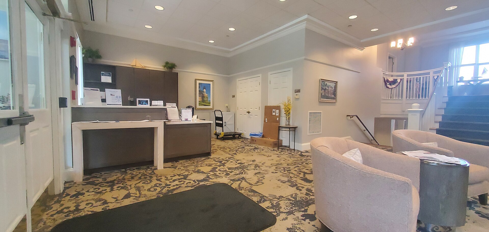 Caregiver assisting residents at a US eldercare facility